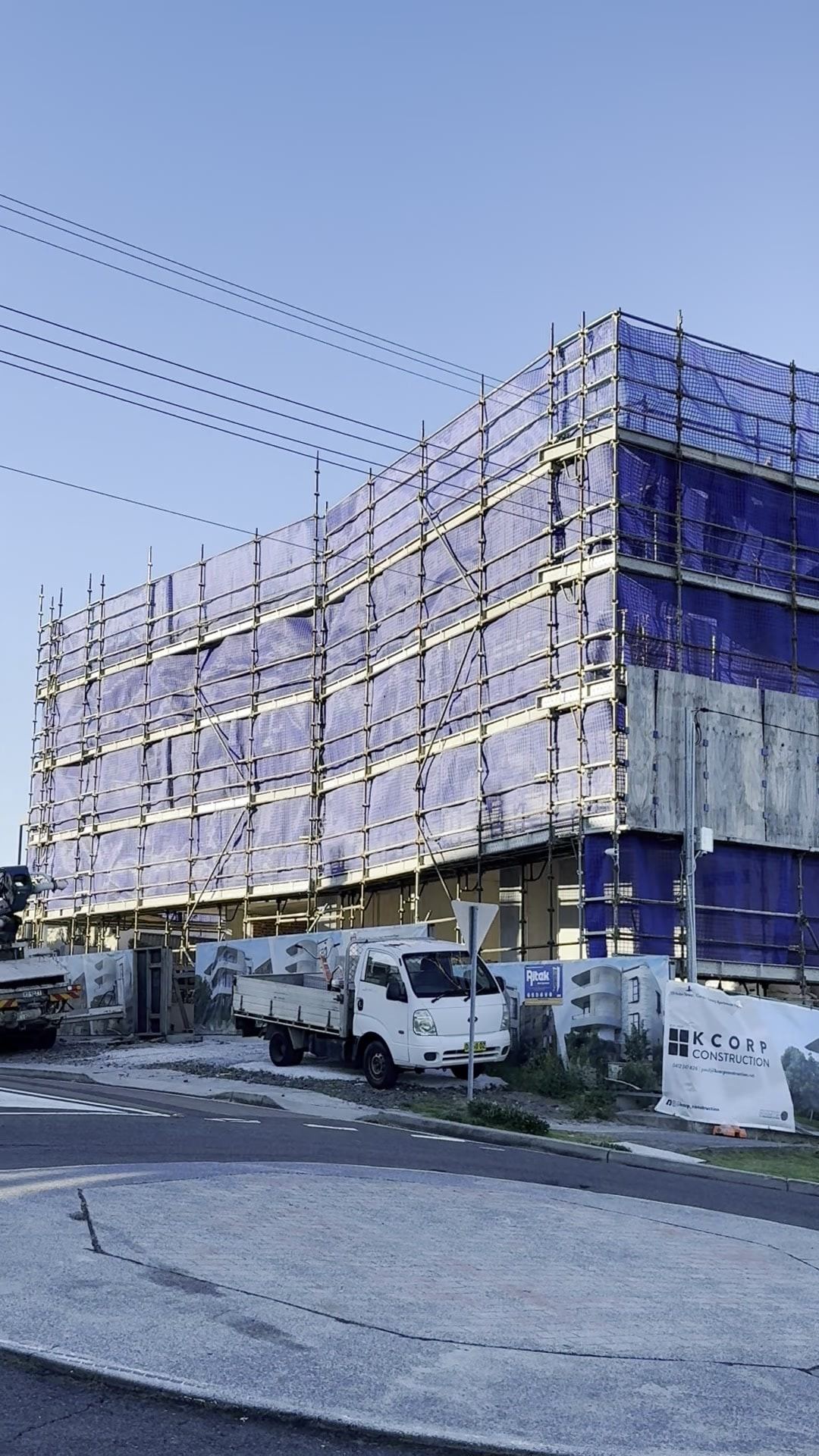 Street view of the completed Coogee scaffold with Kcorp signage