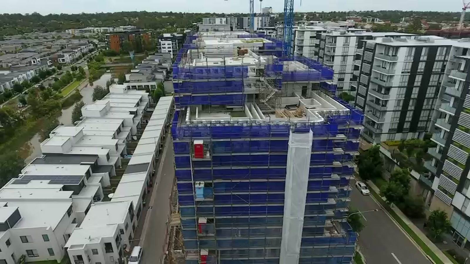 Drone view looking down over the top lift of the Navali scaffold and hoist