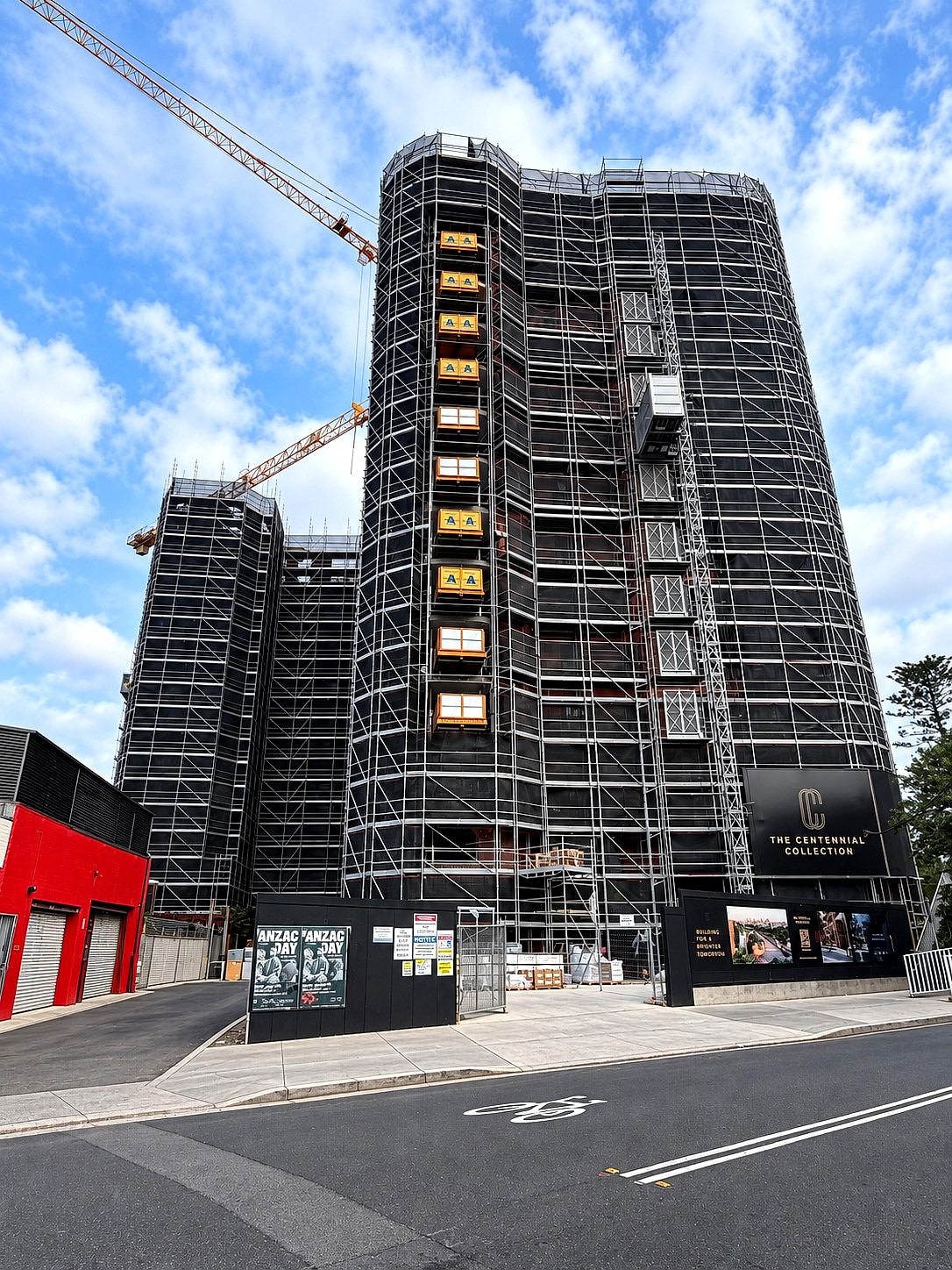 The Centennial Collection, Bondi Junction: a high-rise tower fully scaffolded with hoist and loading platforms